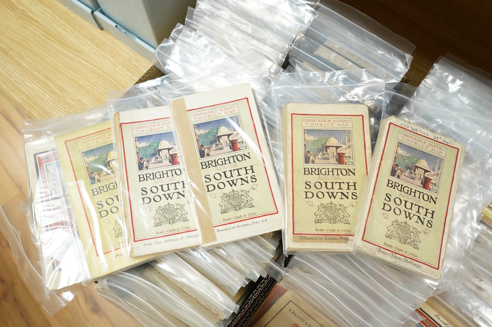 A collection of Ordnance Survey maps including Explorer series 1:25,000, Seventh Series One Inch, together with miscellaneous touring and historic editions (3 boxes)